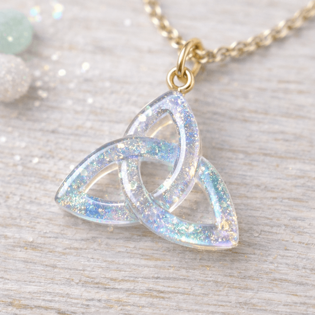 Translucent resin Celtic trinity knot charm with an iridescent shimmer for everyday wear